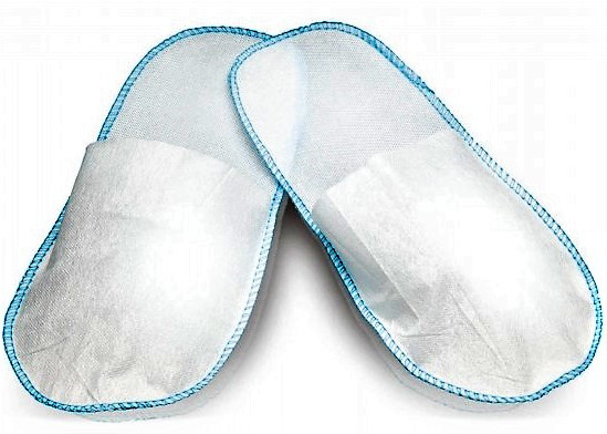 7258.jpg Ciabattina chiusa bianca monouso. Per utilizzo presso centri benessere, etc. Cf 100 pezzi